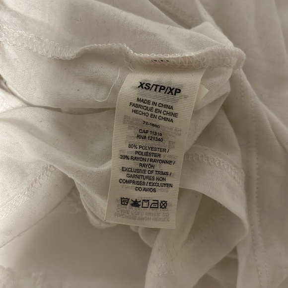 Garage white tank top with exposed back and graphic winking eye detail - Picture 4 of 4